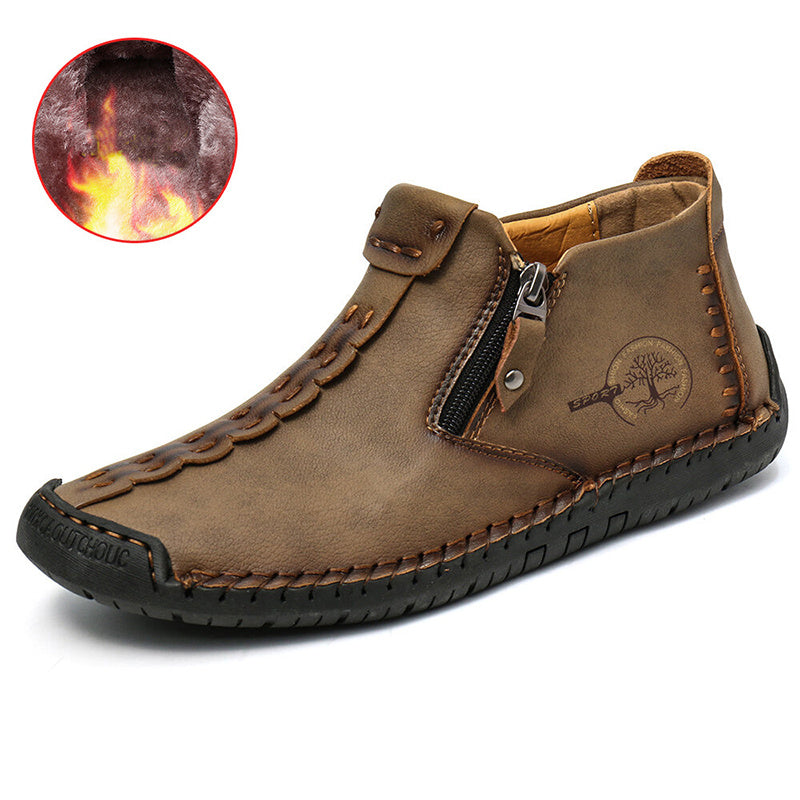 Men's ankle boots in dark tan with side zipper and stitched moc-style toe
