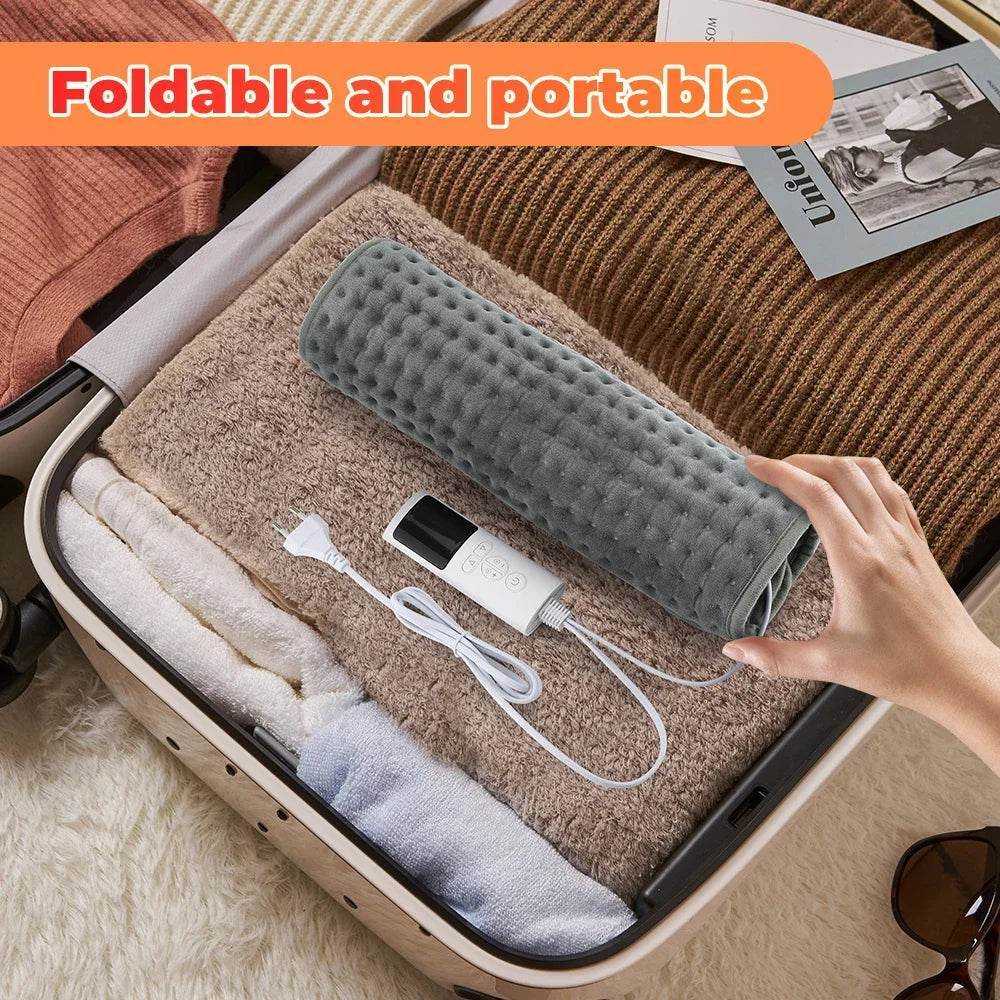 Foldable grey heated foot warmer with cord and controller for portable use