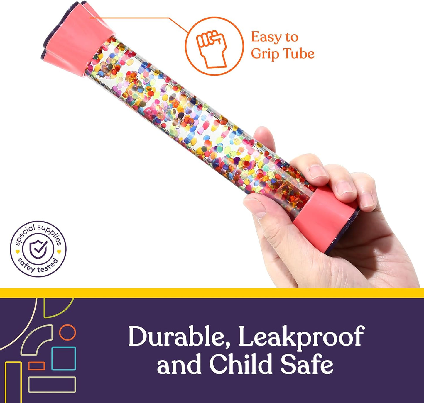 Confetti-filled sensory motion tube with red cap, held in a hand