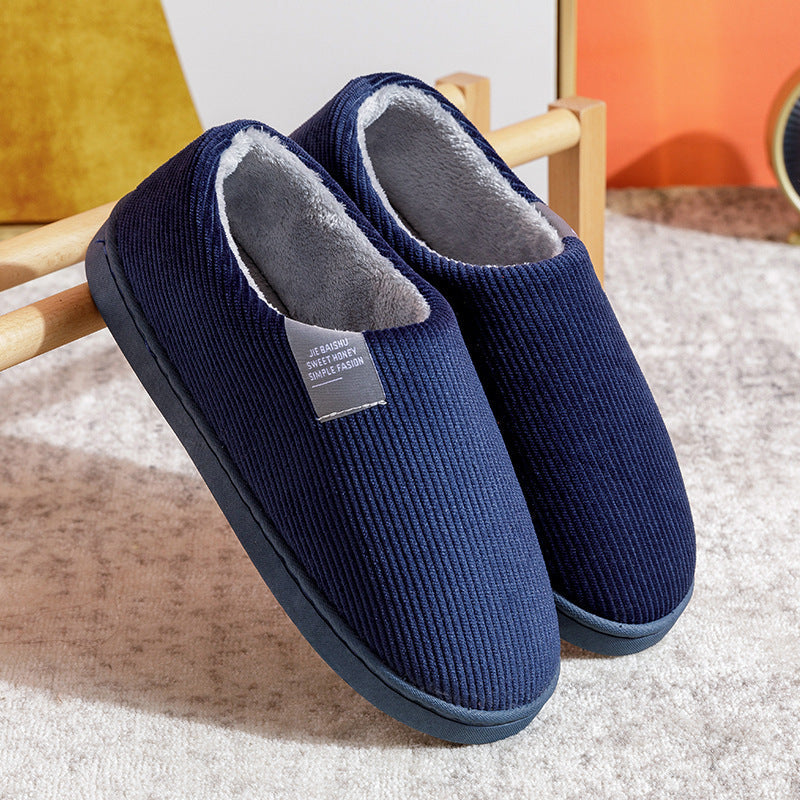 Women’s slip-on slippers, navy blue with fuzzy gray lining and grippy sole