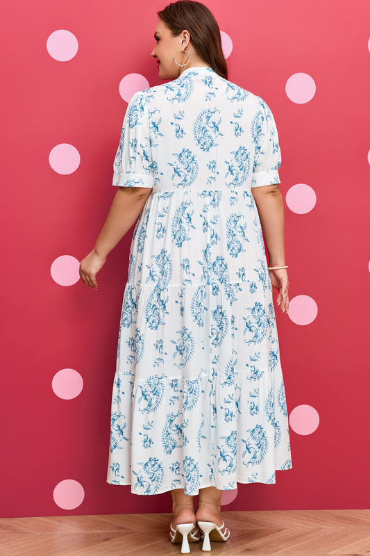 Sky-blue floral short-sleeve maxi dress with tiered skirt and keyhole back detail