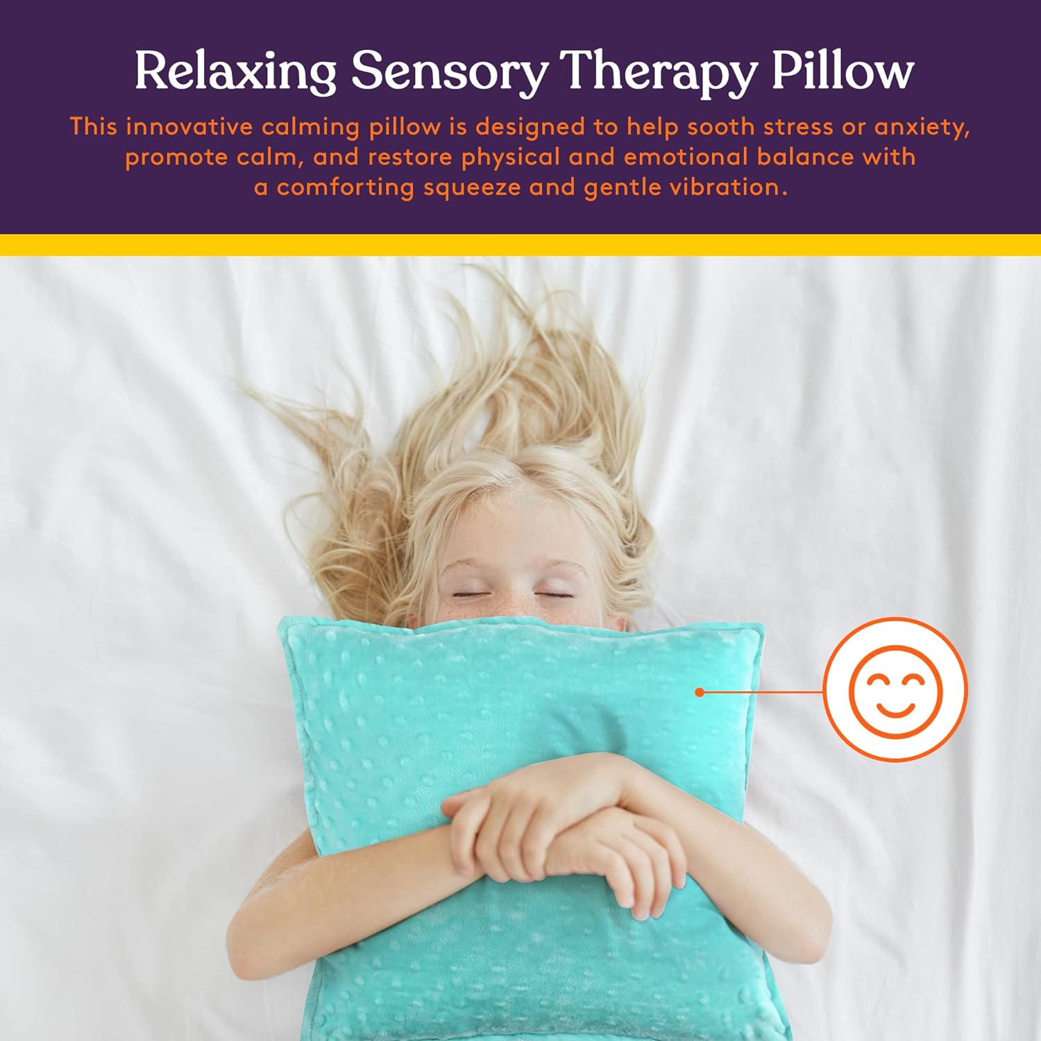 Teal sensory therapy vibrating pillow with dot texture, held over a child’s lap