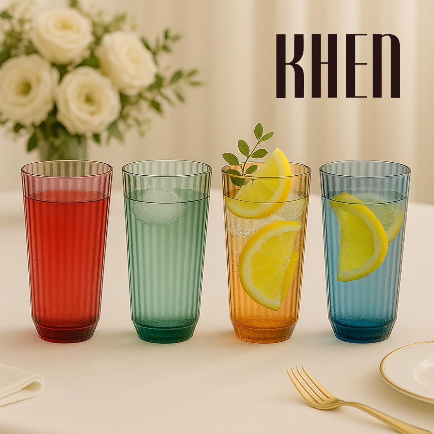 Set of four tall ribbed tumbler glasses with lemon slices, translucent muted tones