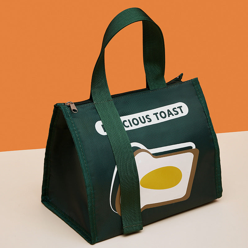 Insulated lunch bag in dark green with “CRICIOUS TOAST” text and fried-egg graphic