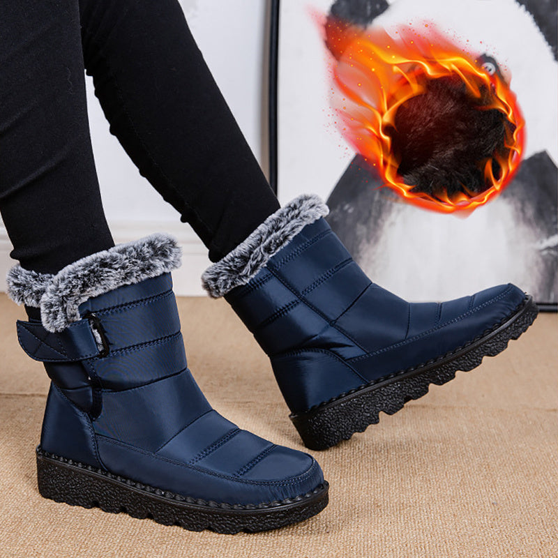 Blue winter snow boots with faux-fur collar, hook-and-loop strap, textured tread platform sole