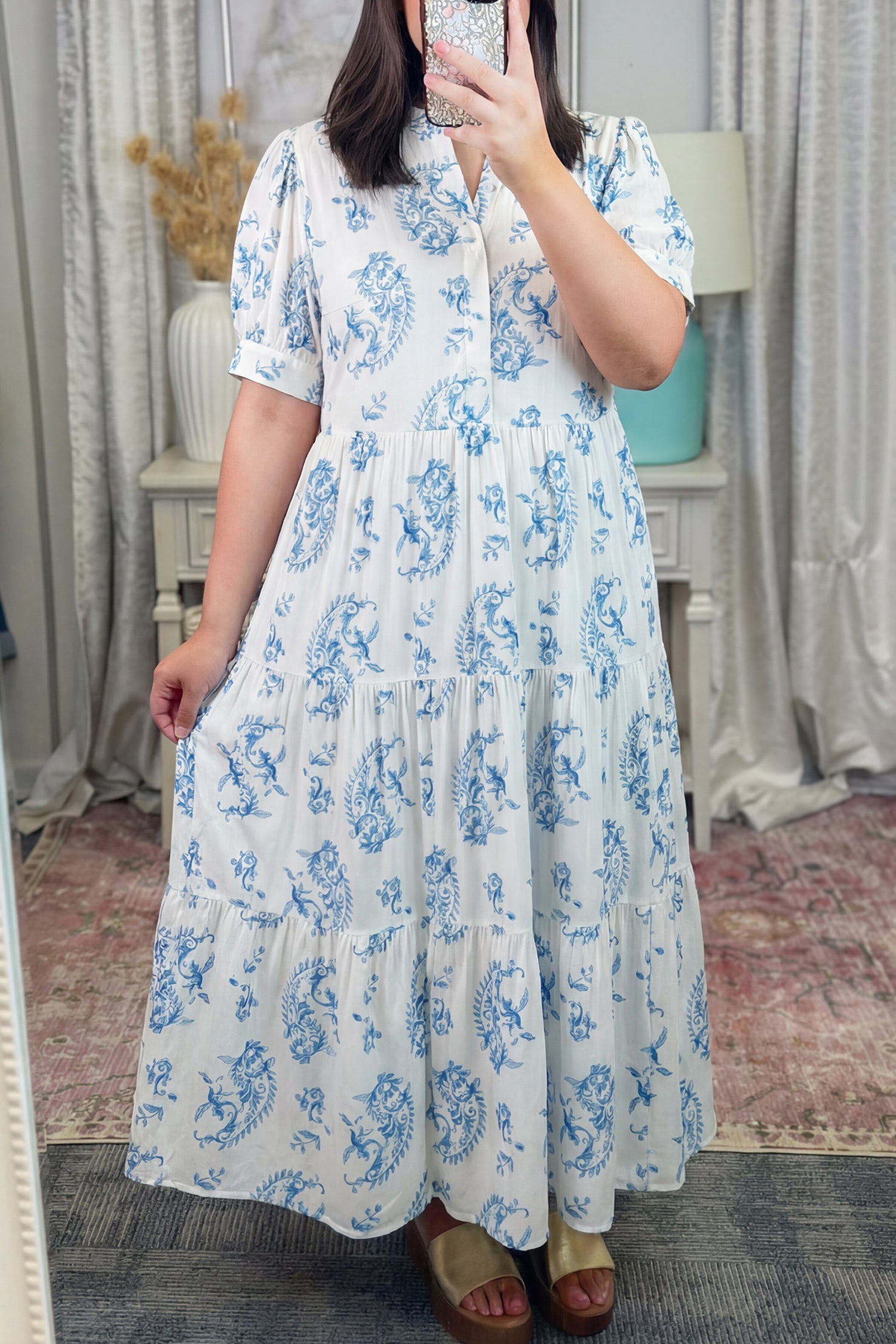 Sky-blue floral short-sleeve maxi dress with gathered waist and layered tiered skirt