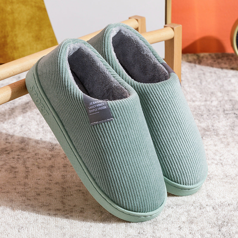Women’s slip-on slippers, mint green with fuzzy gray lining and grippy sole