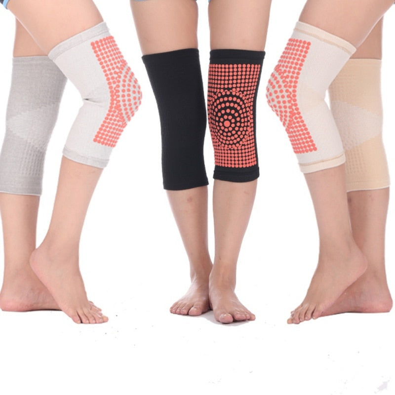 Self-heating knit knee pads with red dot heat panels (grey, black, light yellow)