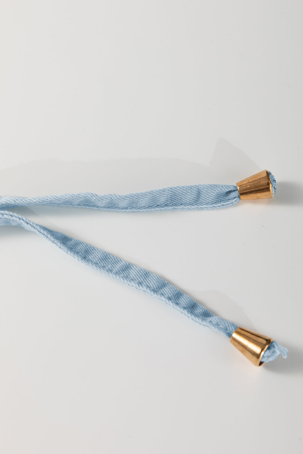 Washed chambray drawstring with tipped ends detail, blue