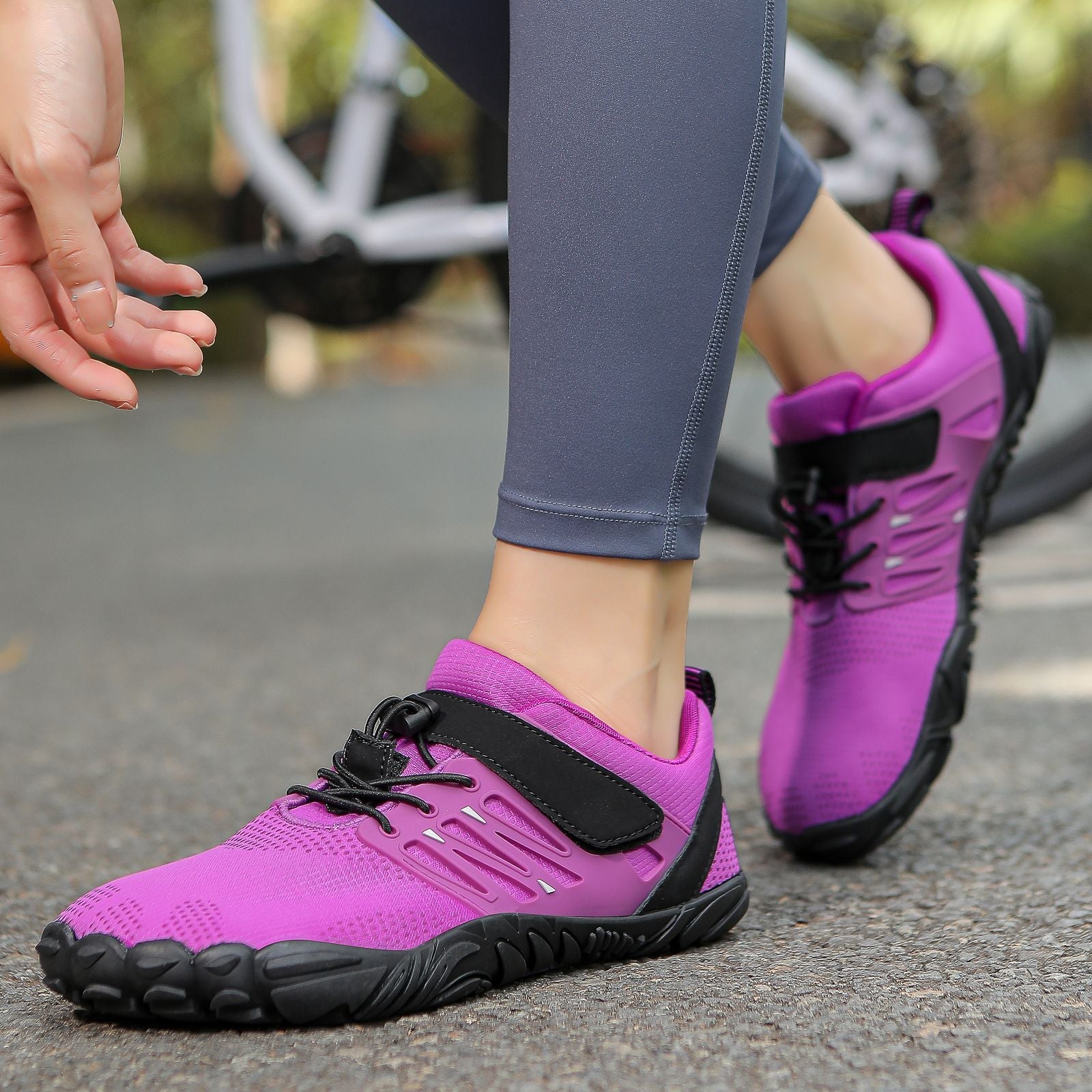 Purple dive water shoes with black strap and laces, thick tread sole for grip
