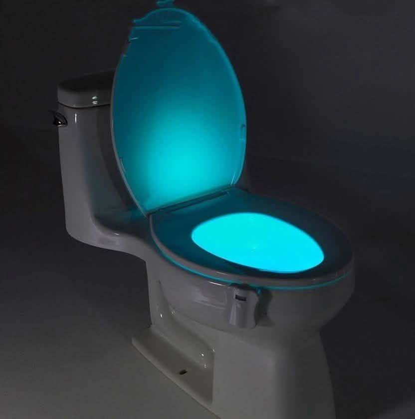 Toilet LED light attachment with blue glowing oval on the seat