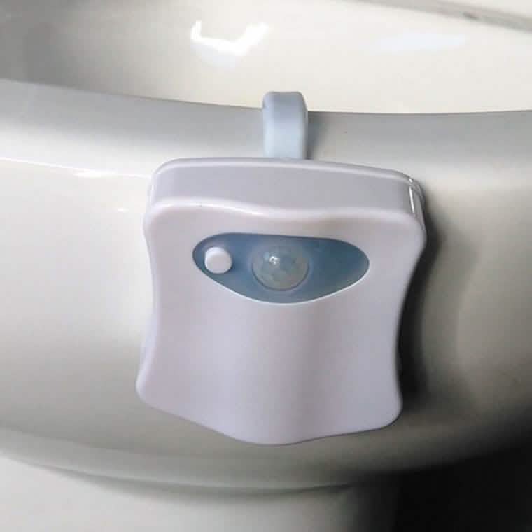 White motion-sensor LED toilet light with blue-tinted sensor window