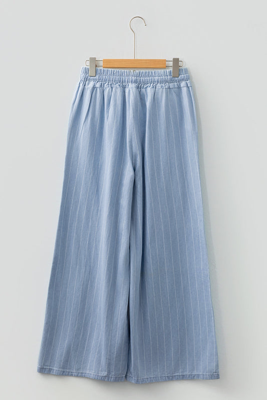 Sky blue stripe tied-waist elastic trousers with wide legs, front view