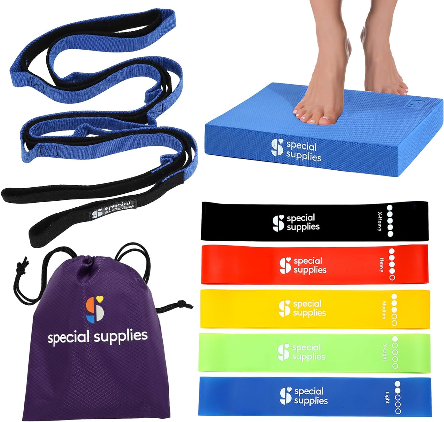 Yoga strap and resistance bands set with purple travel bag and blue foam balance pad