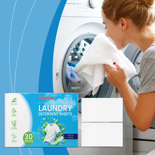 Laundry detergent sheets box beside white cleaning sheets and ribbed tray