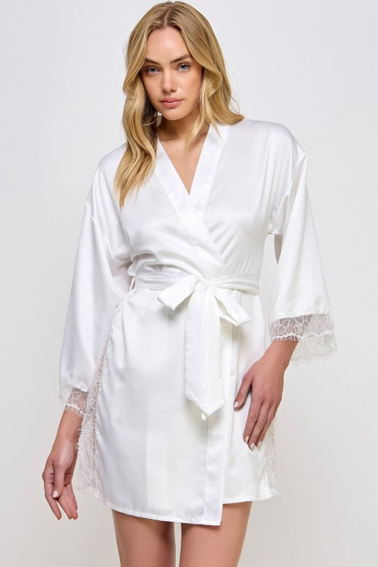 White satin robe with V-neck and tied waist belt, lace-trim details on sleeves