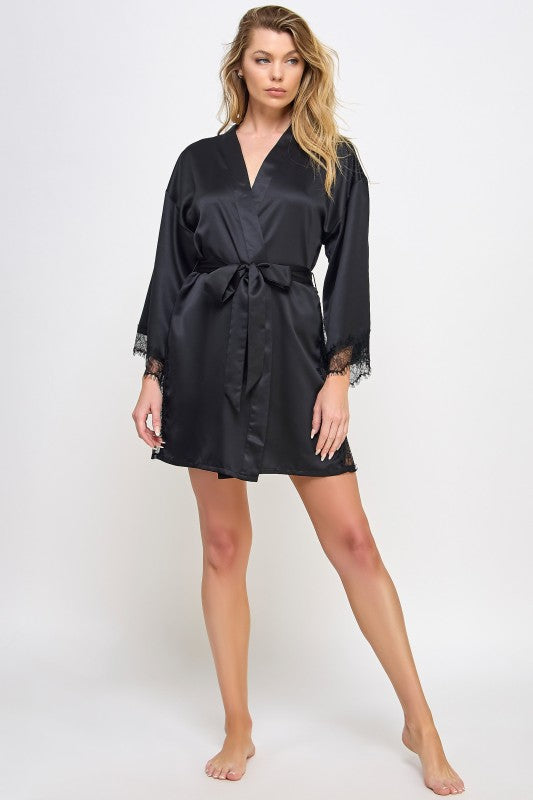 Black satin robe with V-neck and tied waist belt, lace-trimmed sleeves and short hem