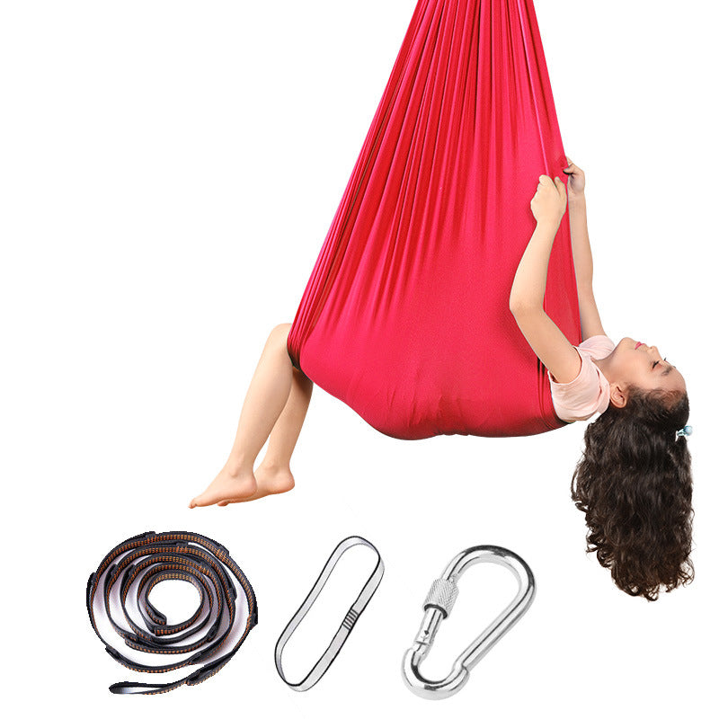 Hanging hammock swing chair in big red with included rope, straps, and carabiners.