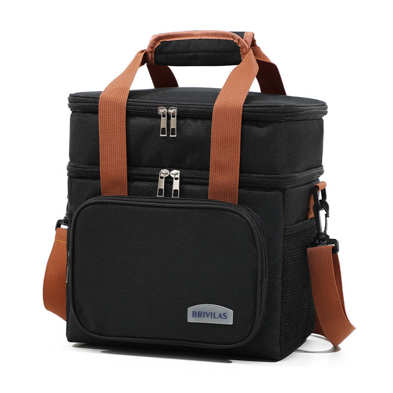Black insulated lunch bag cooler crossbody with orange webbing straps and front pocket