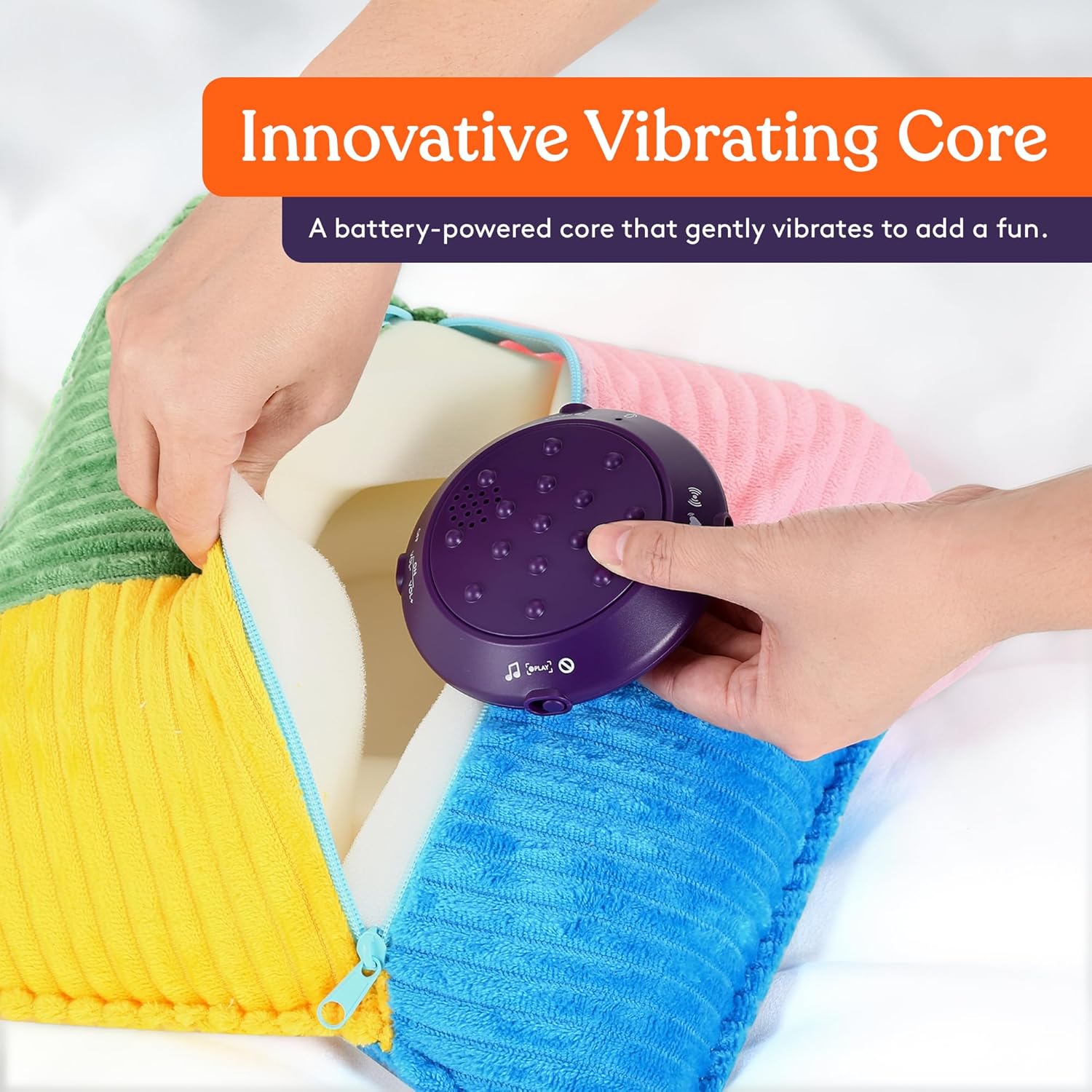 Purple vibrating core being inserted into a rainbow striped pillow pocket