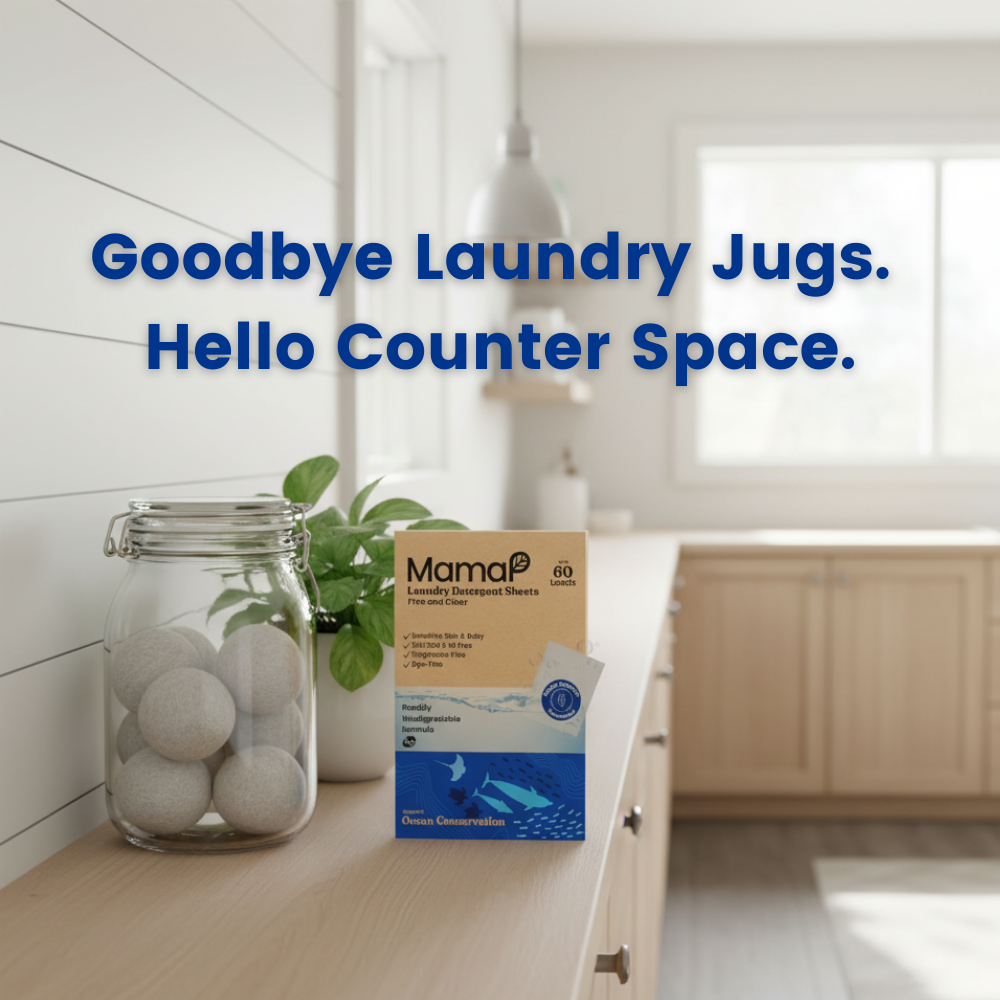 Sensitive skin laundry detergent sheets pack beside a glass jar of laundry balls