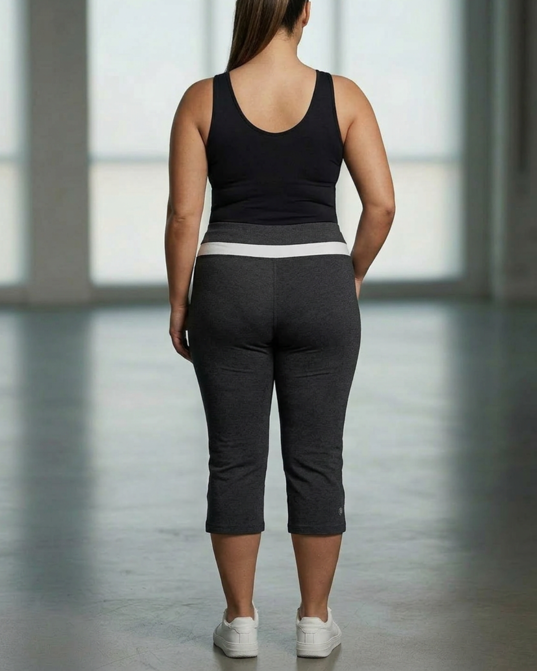 Plus inset capri pants in dark gray, back view with contrast waistband