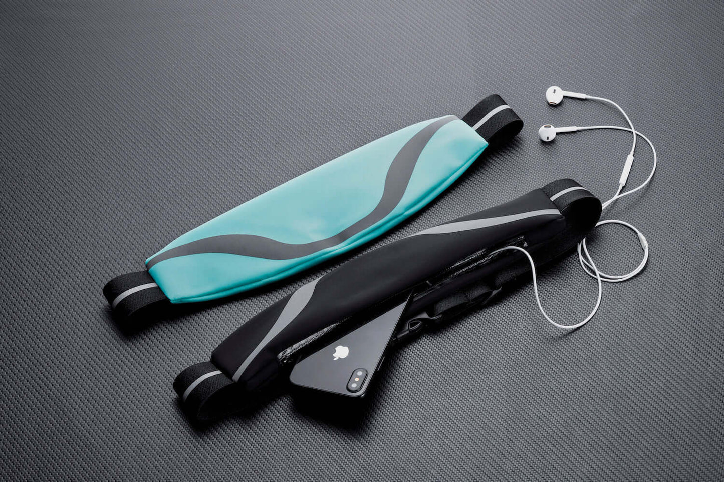 Water-resistant sport waist pack running belt set with black and teal reflective stripes.