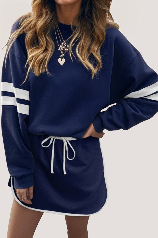 Navy pullover sweatshirt and mini skirt set with white striped sleeves and lace drawstring waist