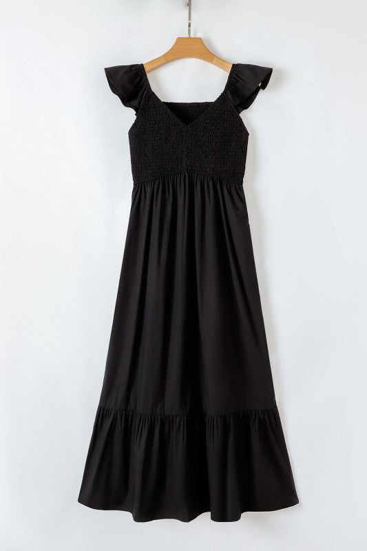 Black flutter-sleeve maxi dress with smocked bodice and tiered skirt