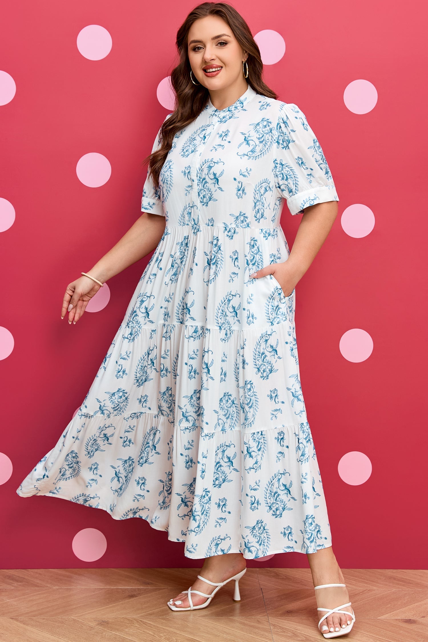 Sky-blue floral tiered maxi dress with short sleeves and gathered waist seam
