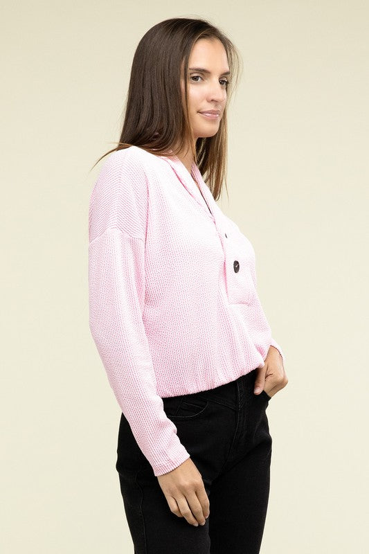 Textured pullover top, pink, V-neck hood with button, long sleeves and pocket