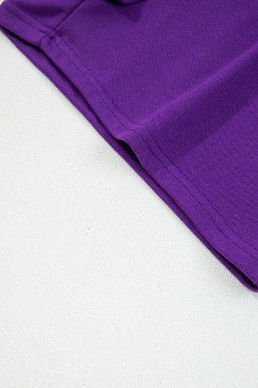 Purple mini skirt with stitched hem and smooth knit finish