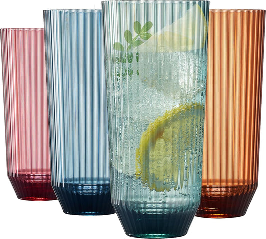 Set of four tall ribbed drinking glasses, muted blue, green, amber and rose