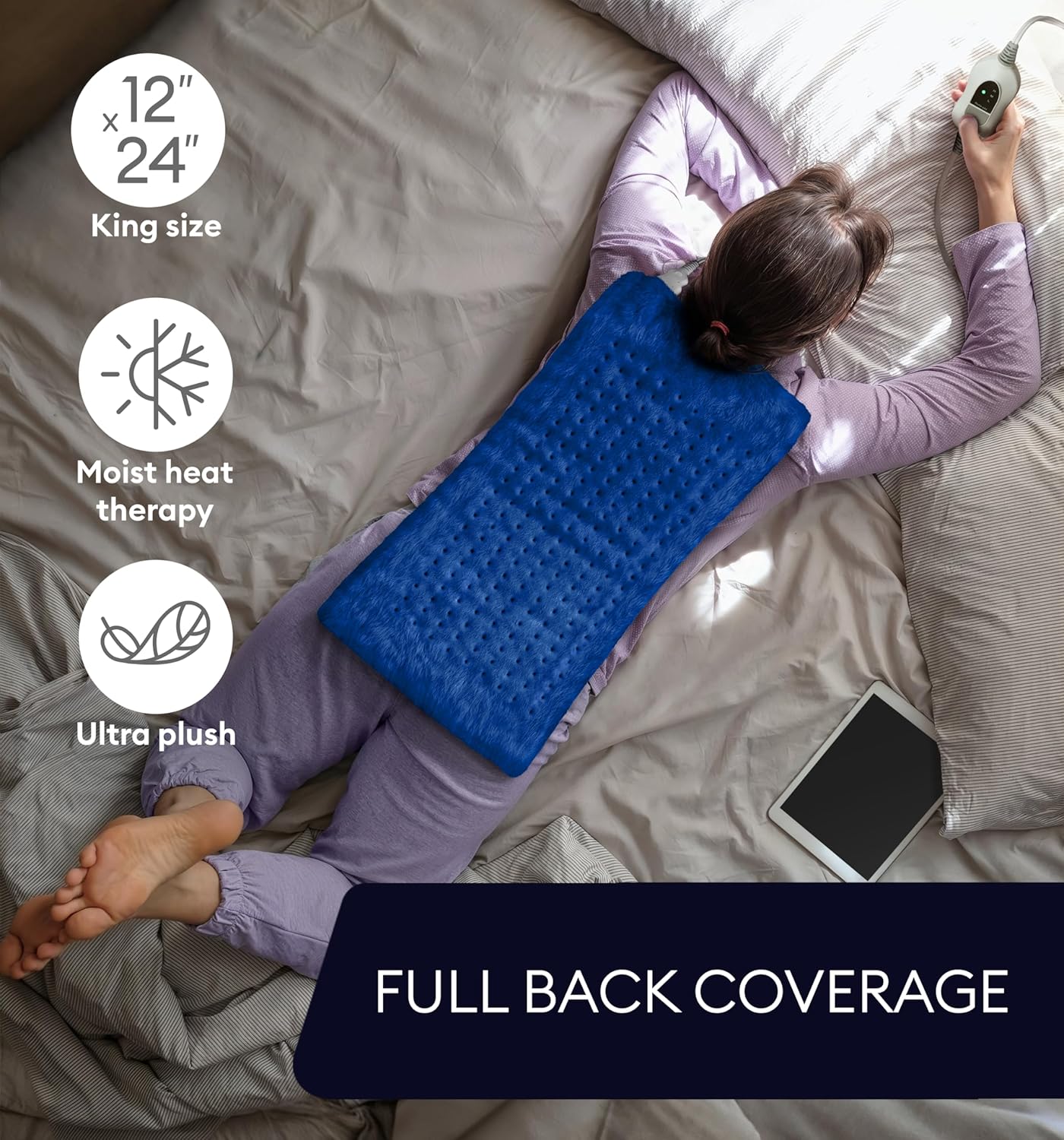 Space blue heating pad laid flat on bed for full back coverage