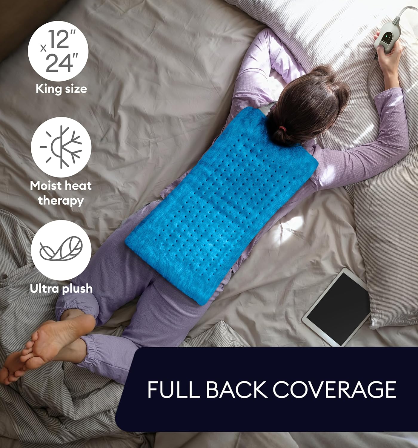 Aqua blue king-size plush heating pad with dotted bumps on bed