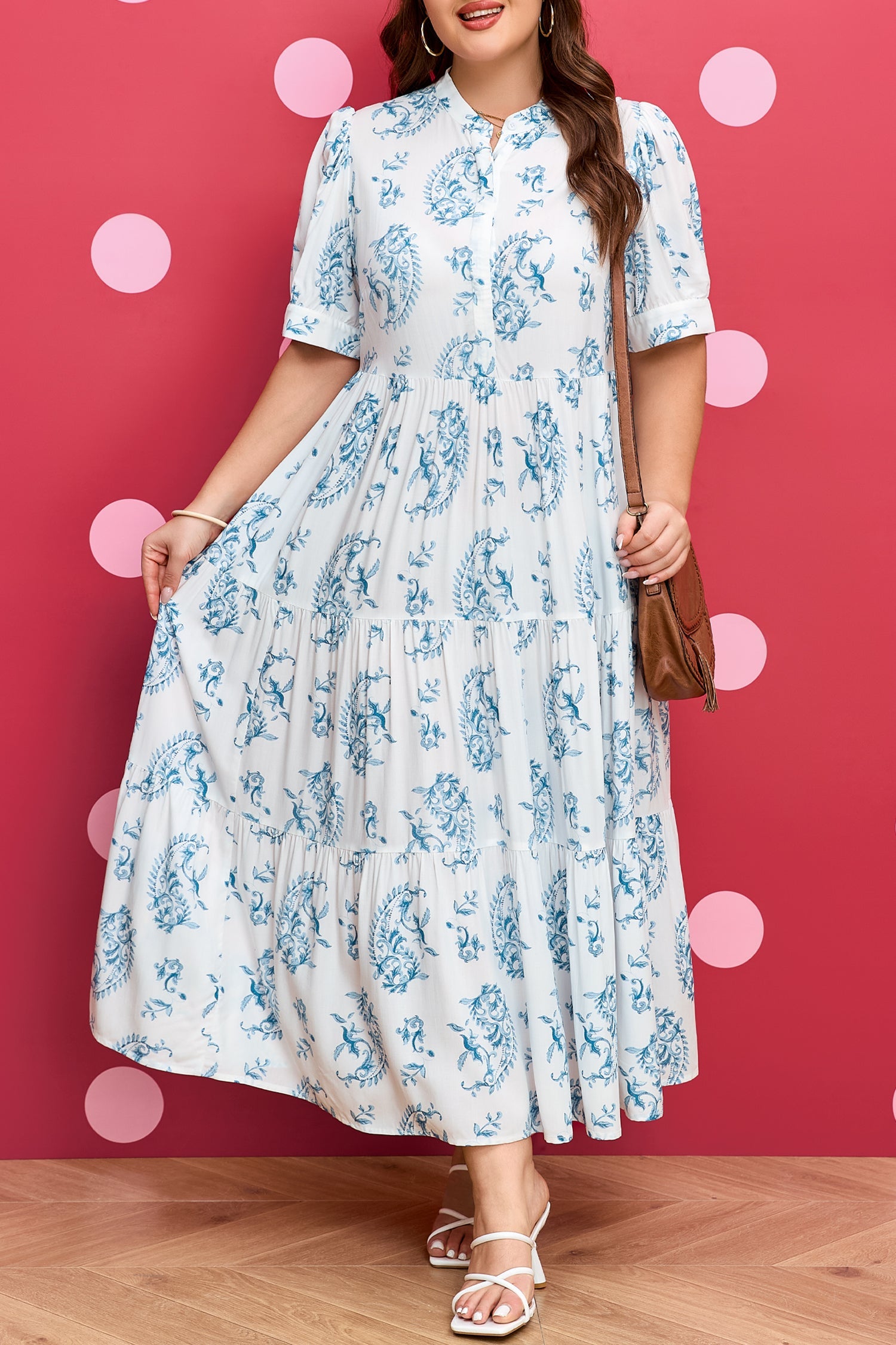 Sky-blue floral tiered maxi dress with short sleeves and ruffled hemline
