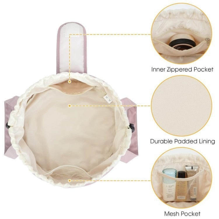 Pale pink drawstring makeup bag interior with inner zippered pocket and mesh pocket