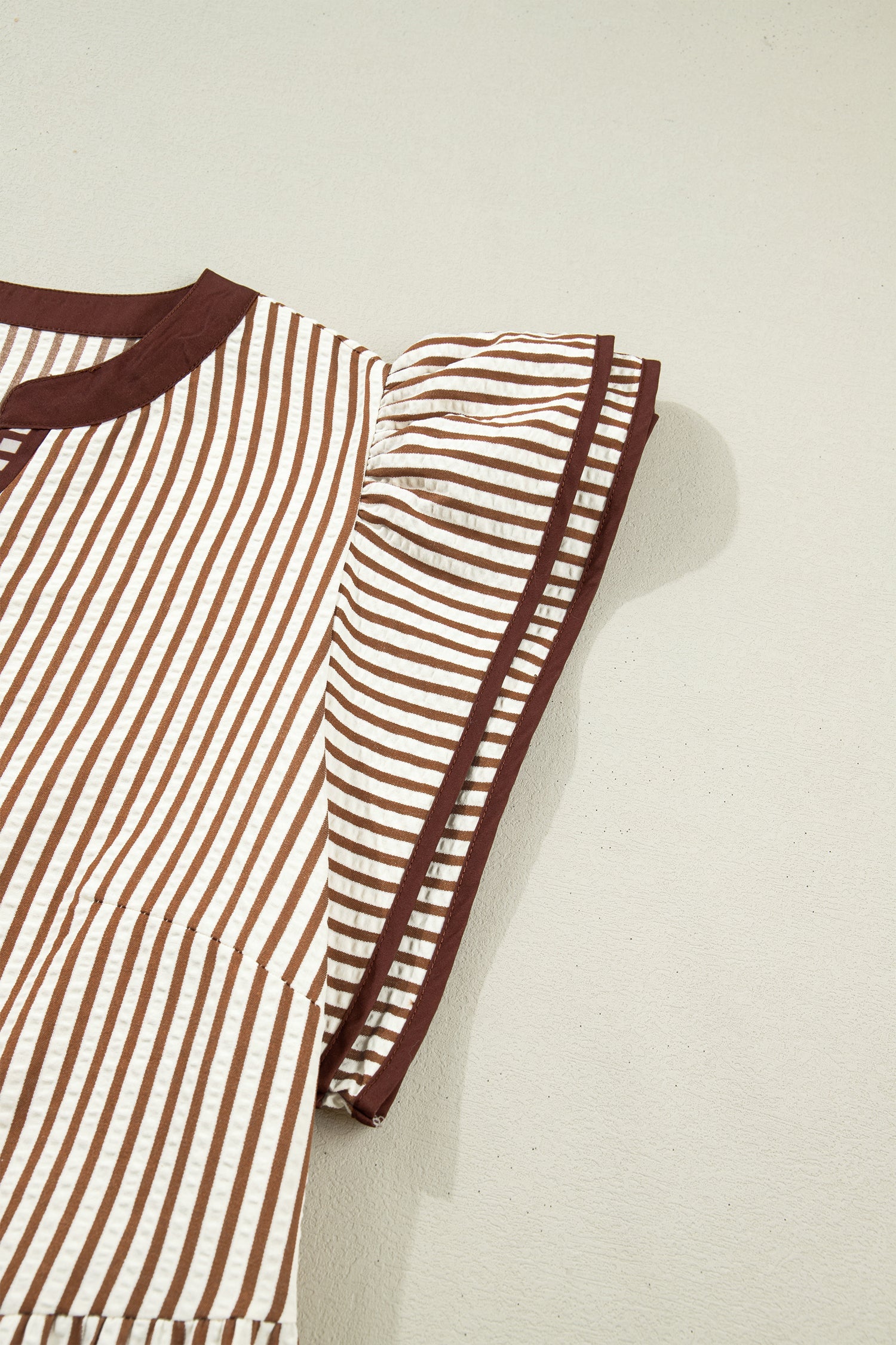 Brown-and-cream striped plus maxi dress with flutter sleeve and contrast trim