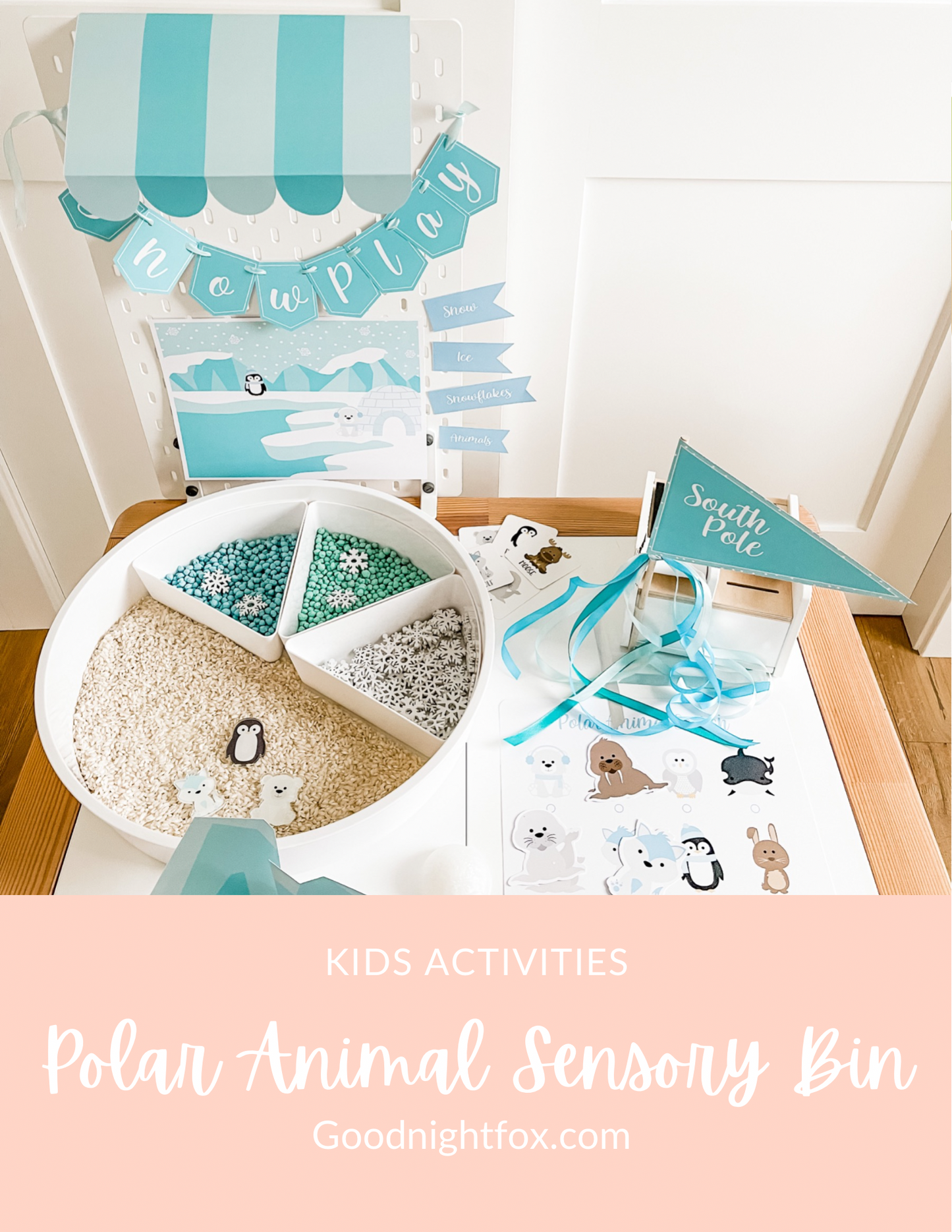Polar animal sensory bin set with circular tray, blue ribbon streamers, and animal graphic mat