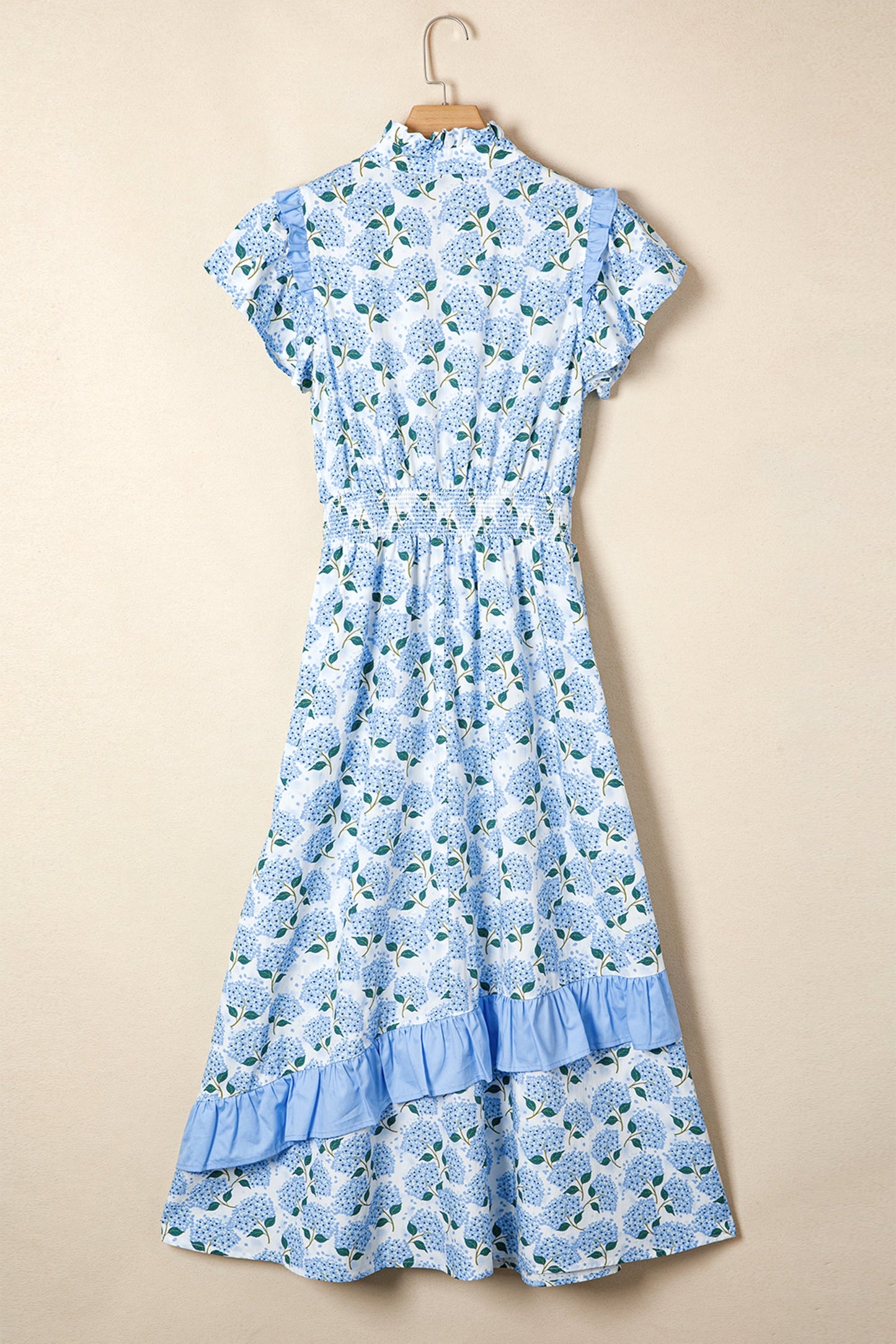 Sky blue long dress on hanger, flutter sleeves and tiered ruffle hem with floral print