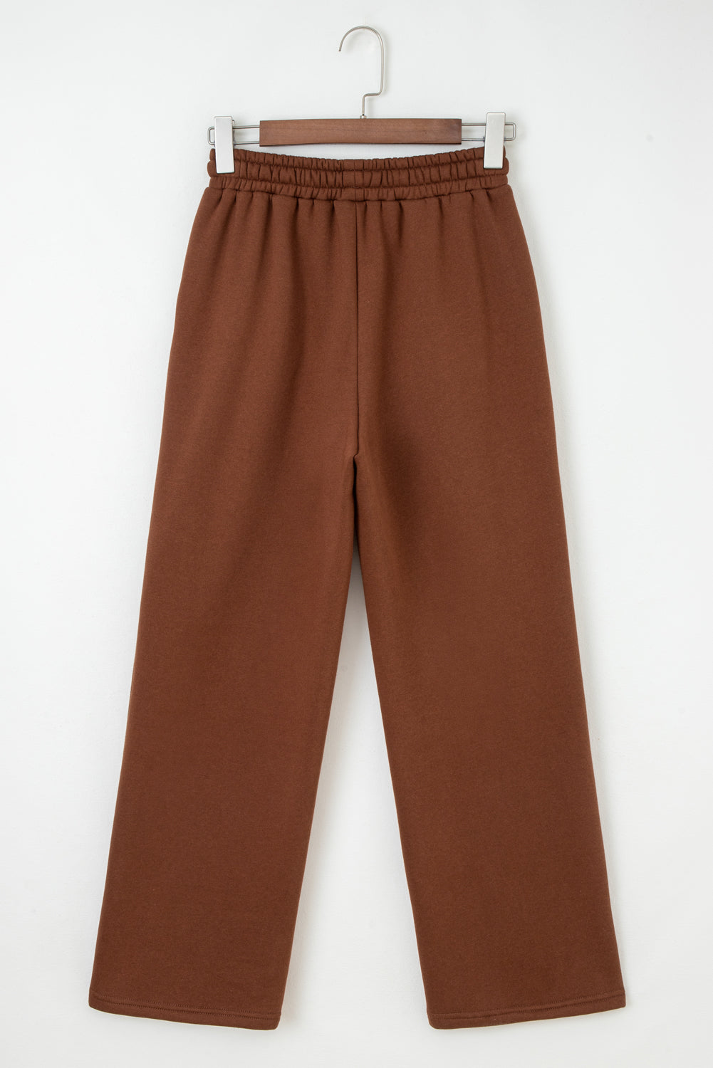 Coffee-brown solid pants with elastic waistband, straight wide-leg silhouette