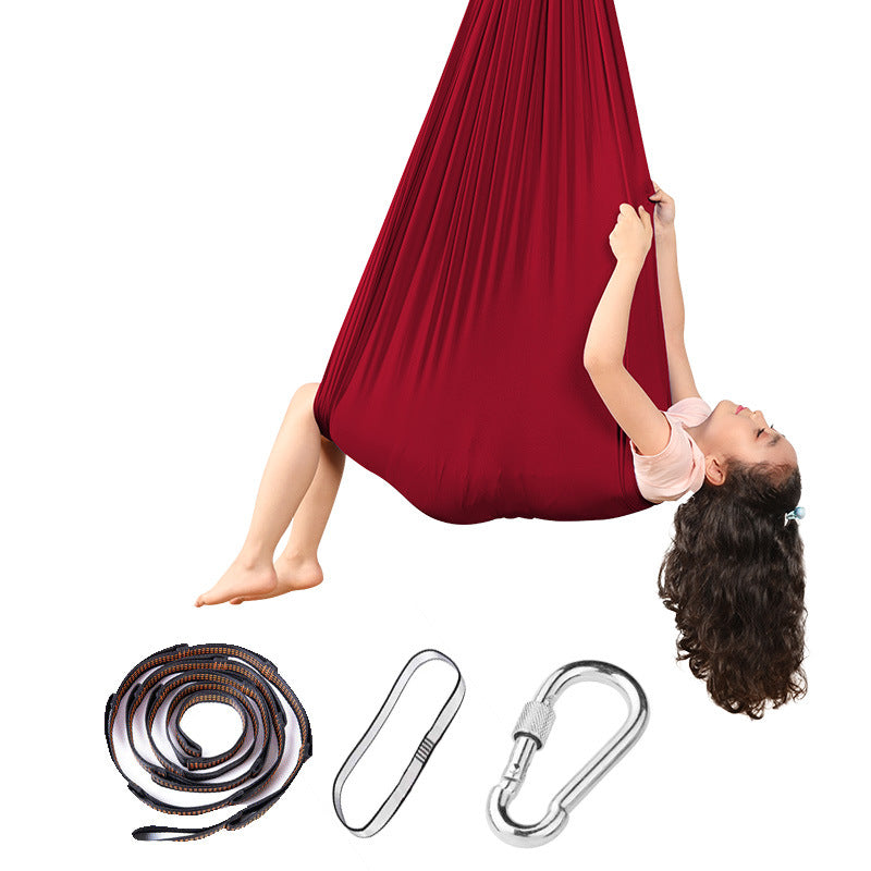 Hanging hammock swing chair in wine red with included rope, straps, and carabiners.