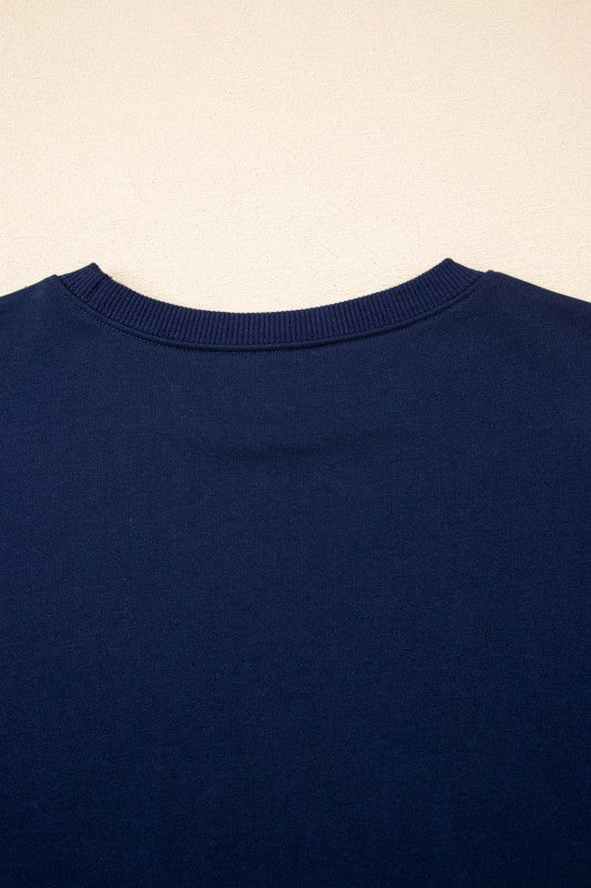 Navy varsity stripe pullover, crew neckline and ribbed trim at collar.