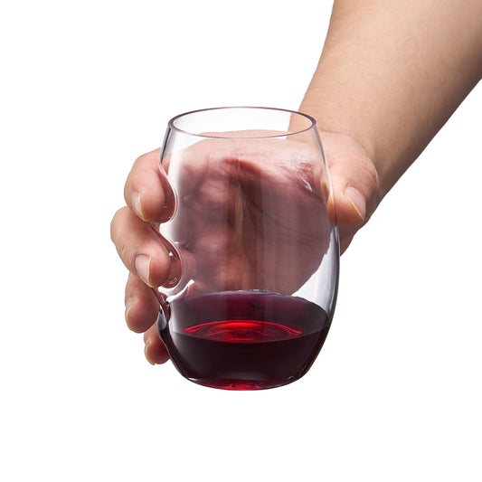Stemless finger-indent wine glass in hand, clear acrylic, filled with red wine