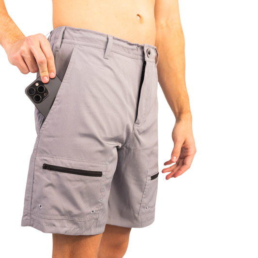 Light gray waterproof shorts with zip pocket and drawstring waistband, side view