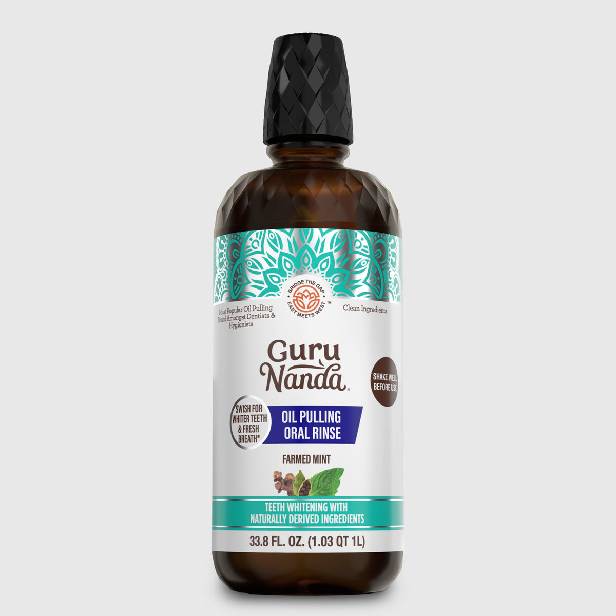 Guru Nanda oil pulling oral rinse bottle with teal decorative label and black cap