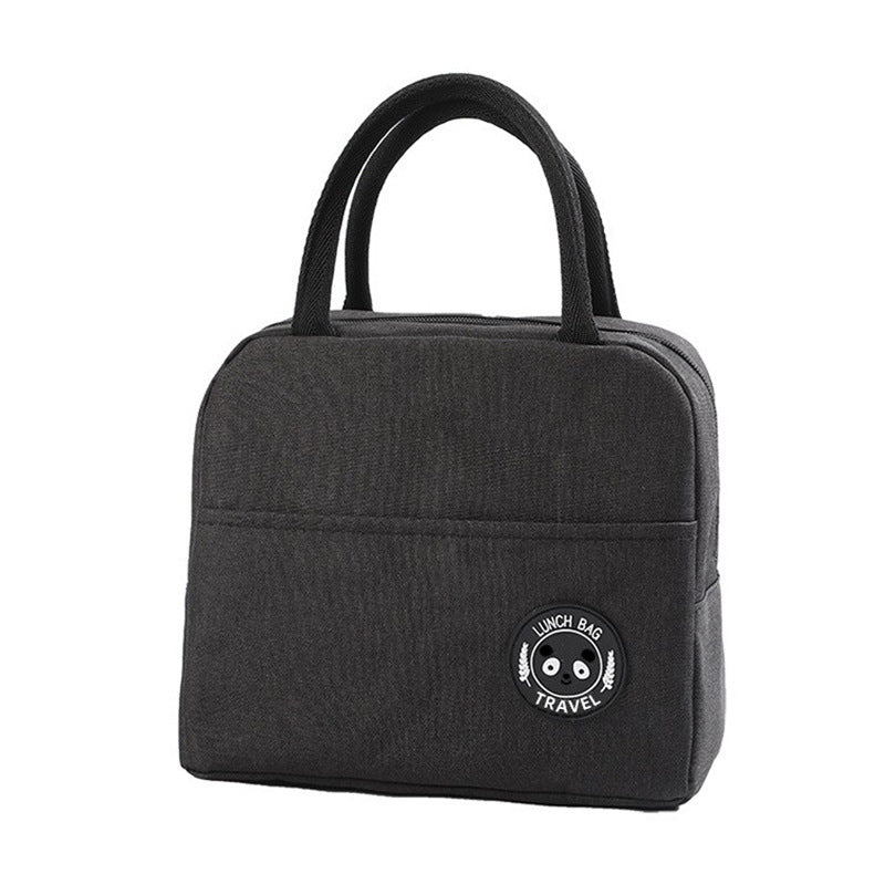 Gray insulated lunch bag with top handles and round bear logo patch on the front.