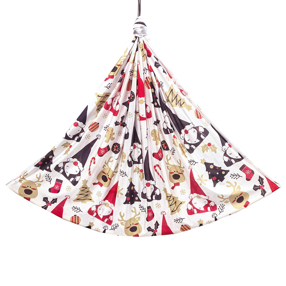 Sensory hammock swing chair with white fabric and colorful animal print canopy