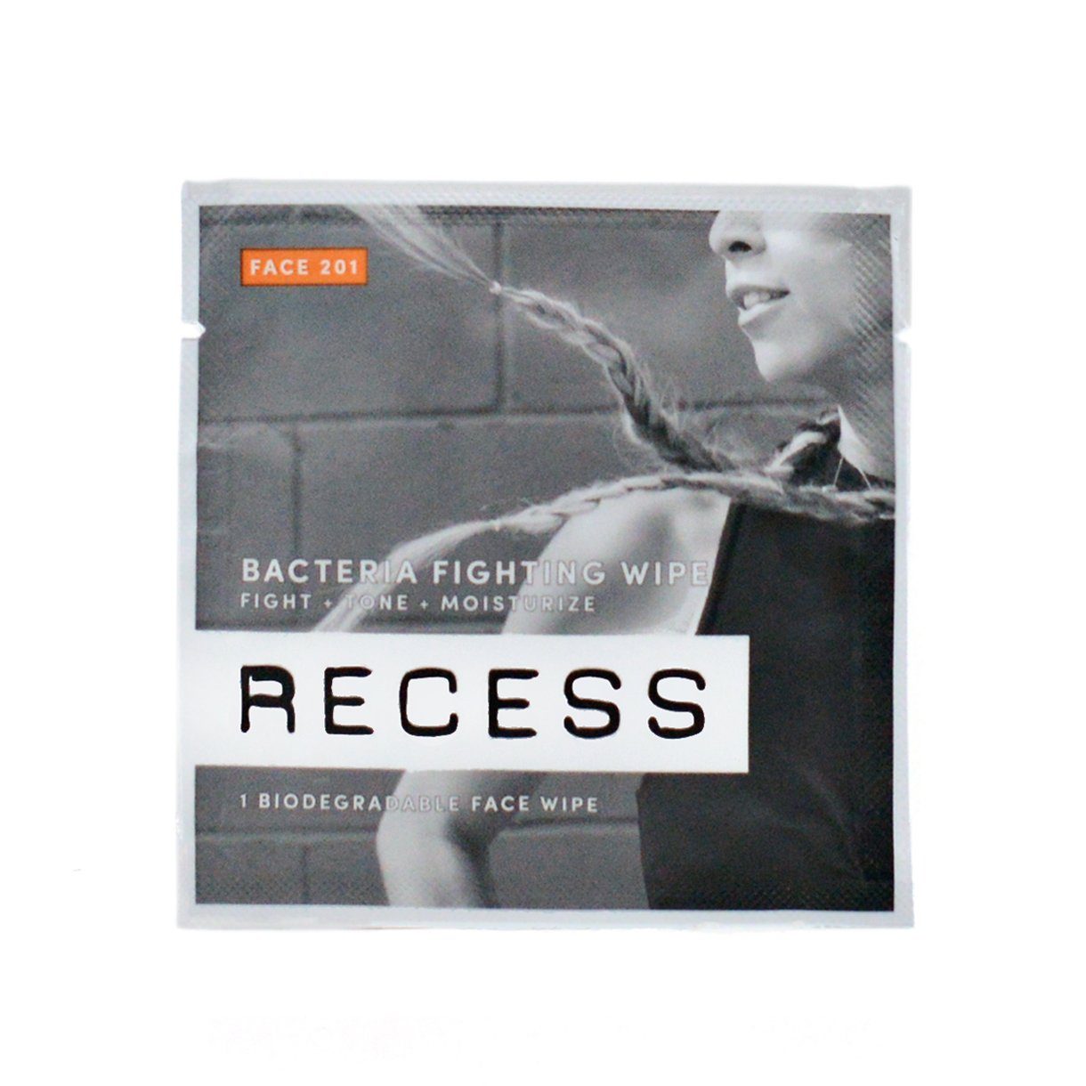 Biodegradable face wipe packet in black-and-white design.