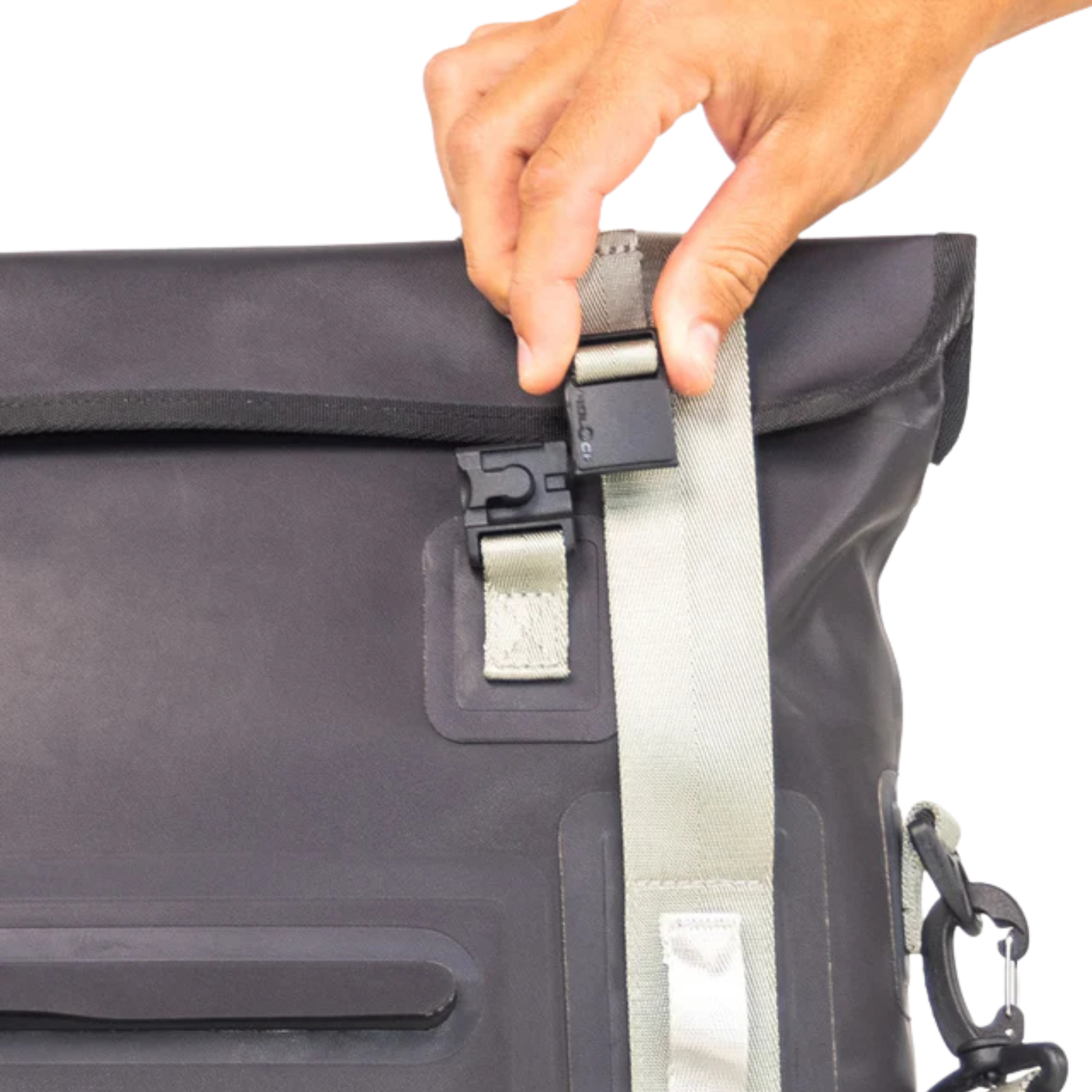 Waterproof tote cooler strap and buckle detail on dark gray bag, with white webbing